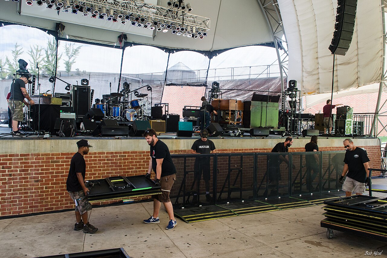 Crew working on stage equipment