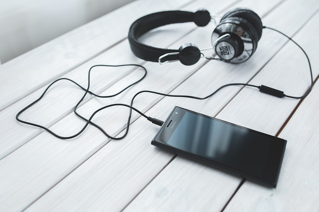 Headphones connected to a smartphone