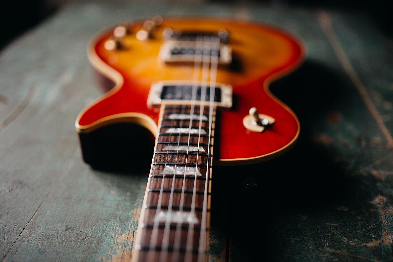 Electric guitar body, strings and pickups in close-up